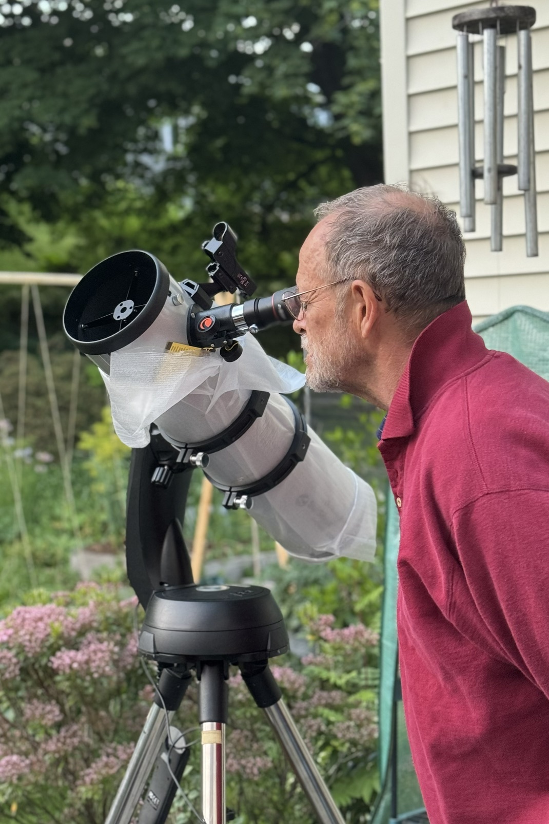 Chris Young inspects the Celestron StarSense 130